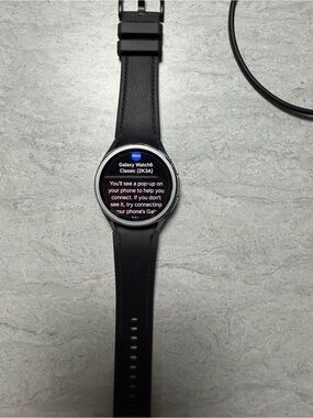 Samsung Smartwatch with Silver Case and Black Strap